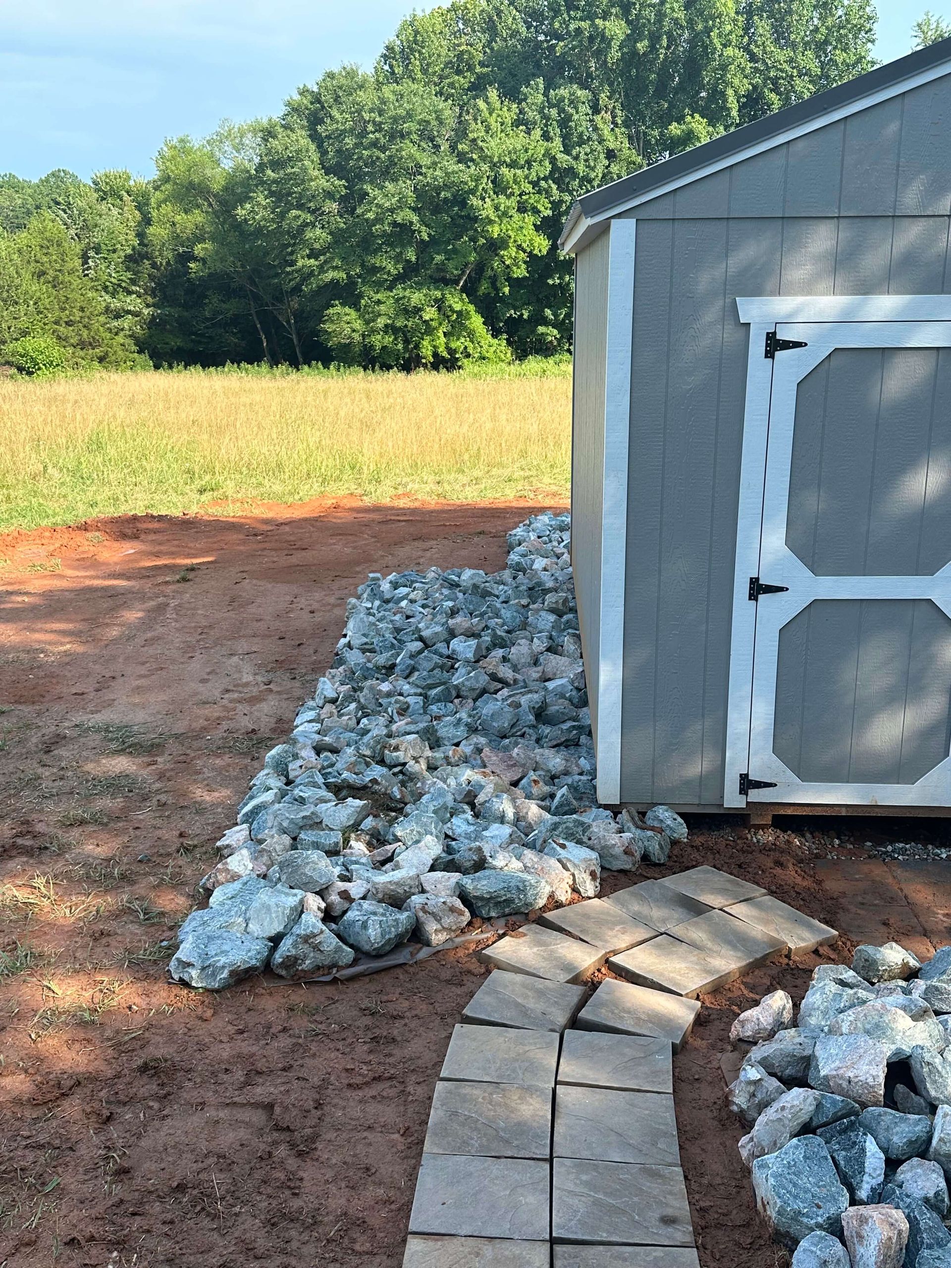 landscape, rock bedding, stone, landscape design, tree removal company, tree service, chesterfield va tree company