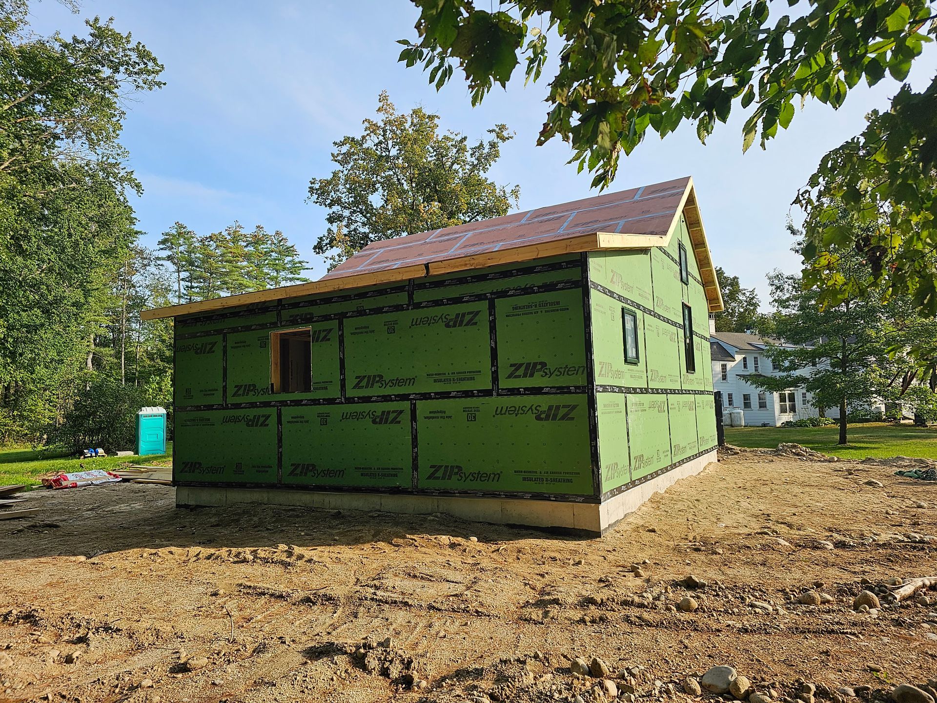a ranch house that is being built with zip system