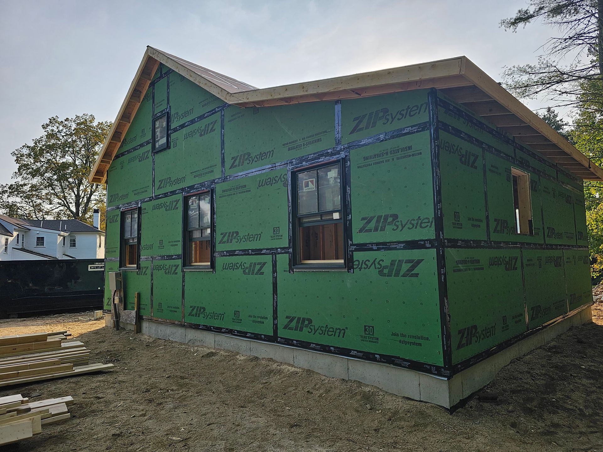 a house that is being built with zipsystem with three windows