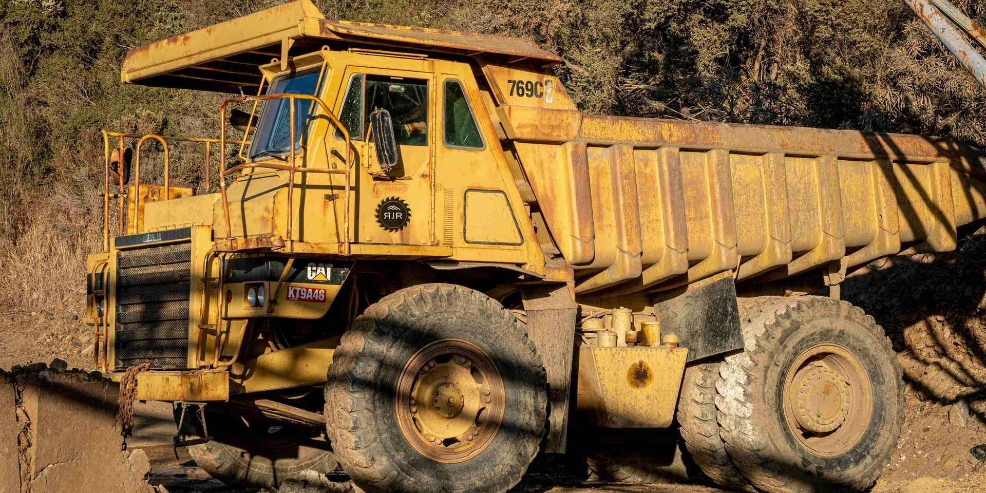 a yellow dump truck