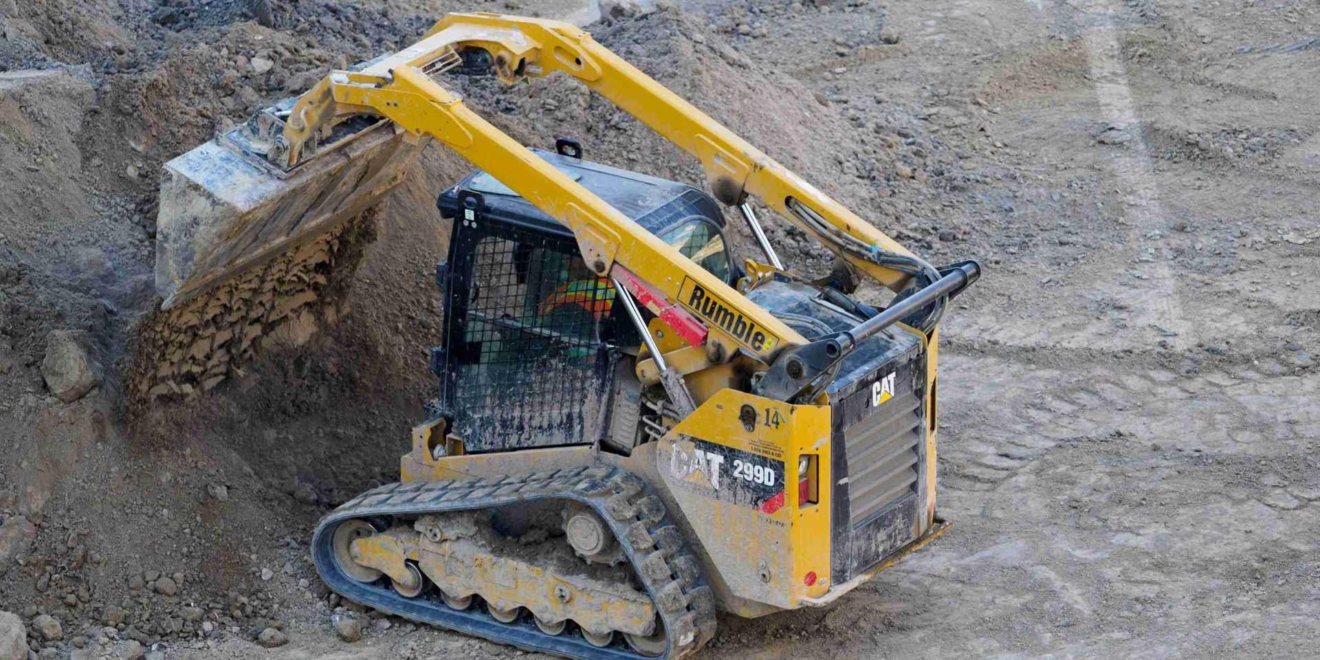 a bulldozer pouring dirt