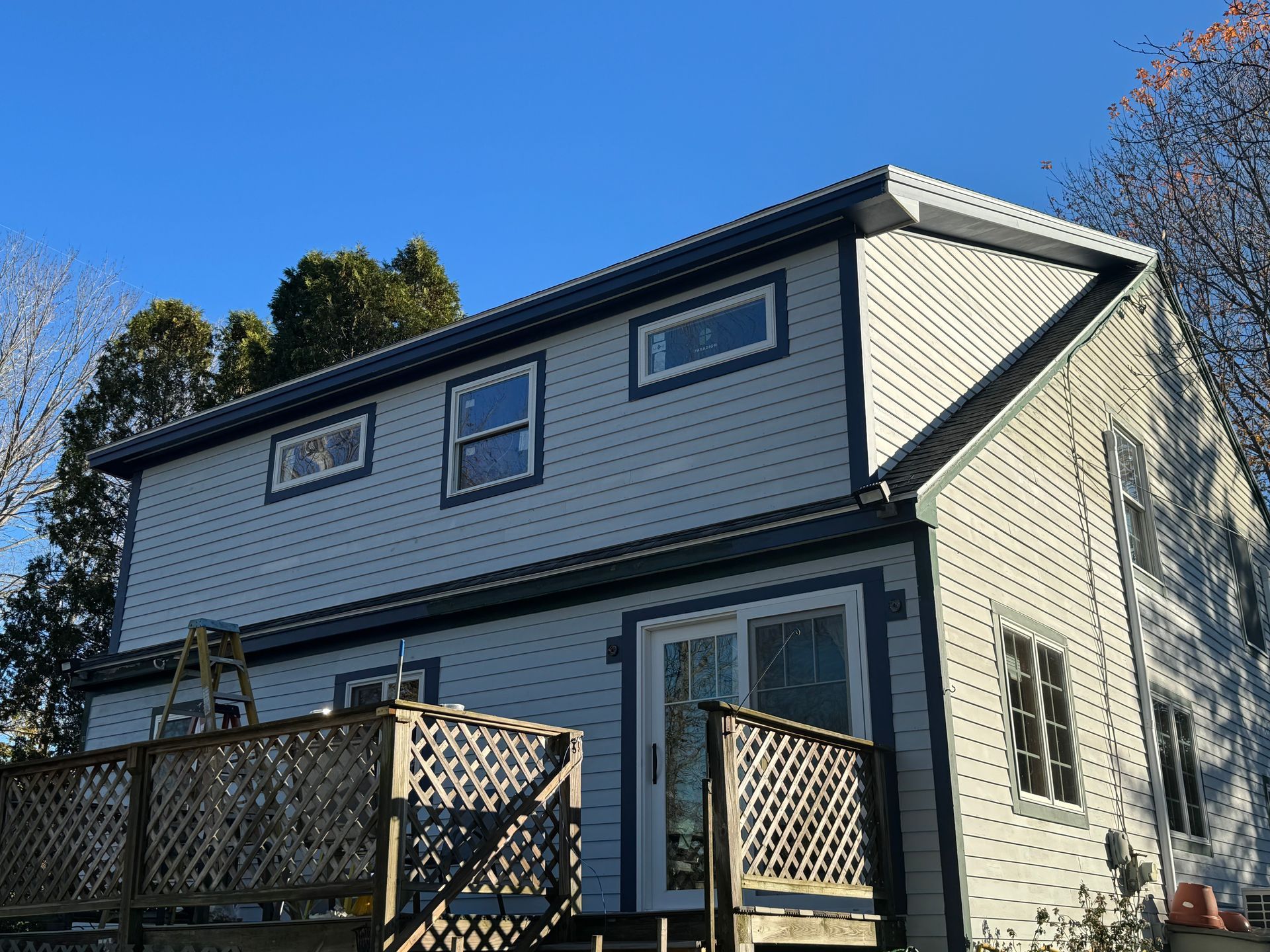 a house with a ladder on the side of it
