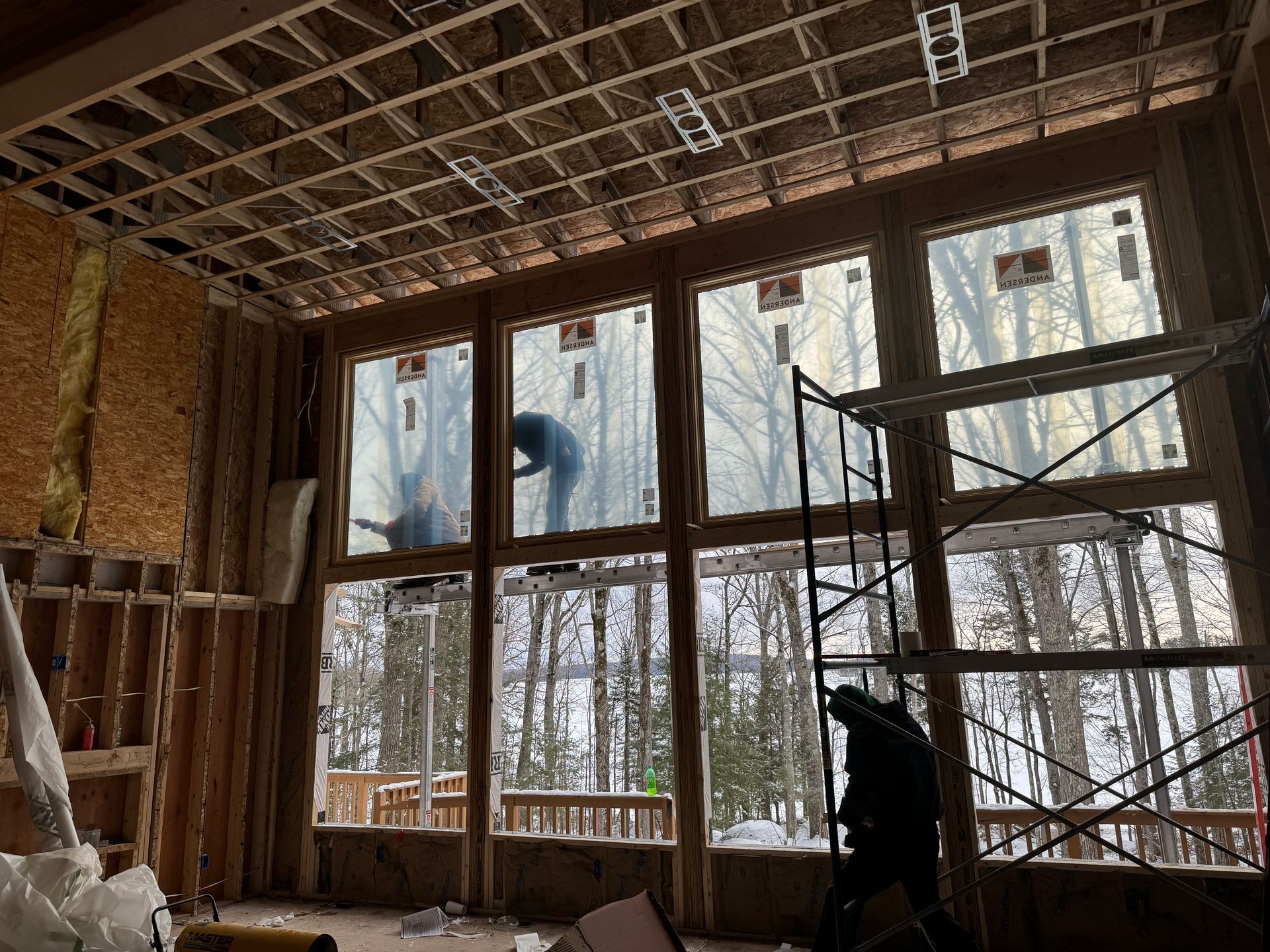 a bunch of carpenter hand tools are hanging on a wooden wall