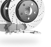 Brake rotors and pads, black and silver, for vehicle maintenance, automotive parts. | A+ Brakes & Suspension