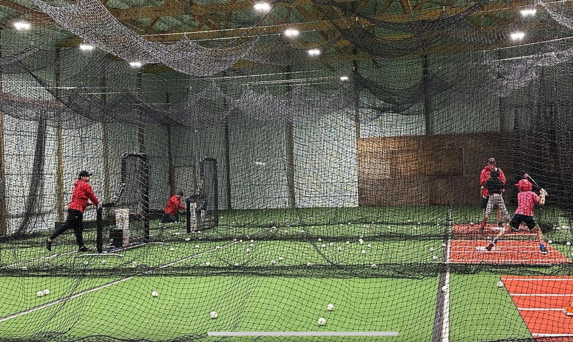 A group of people are playing baseball in a stadium.