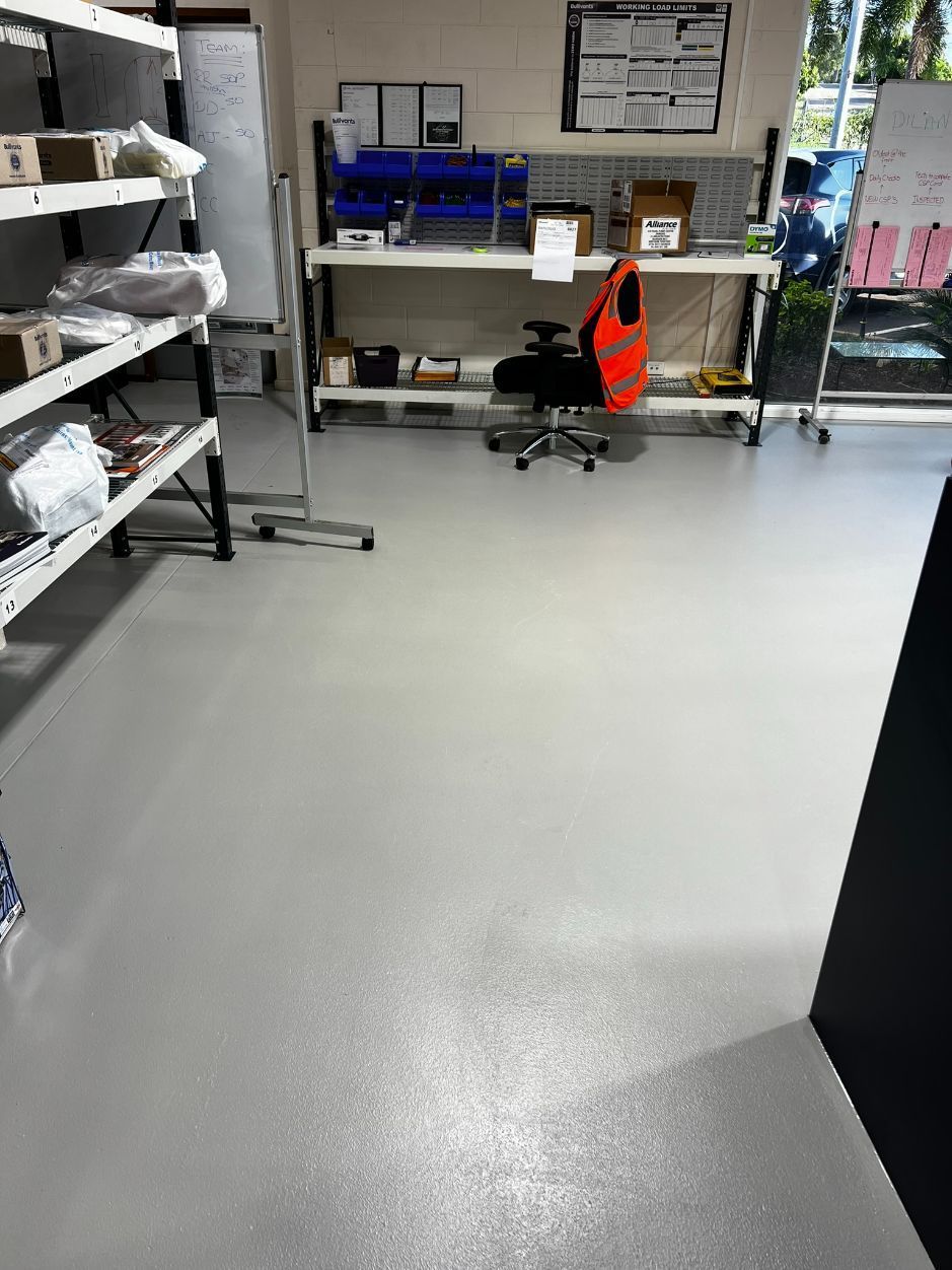 An Empty Living Room With A Tiled Floor And A Window — Regina's Cleaning Group Pty Ltd In Lee Point, NT