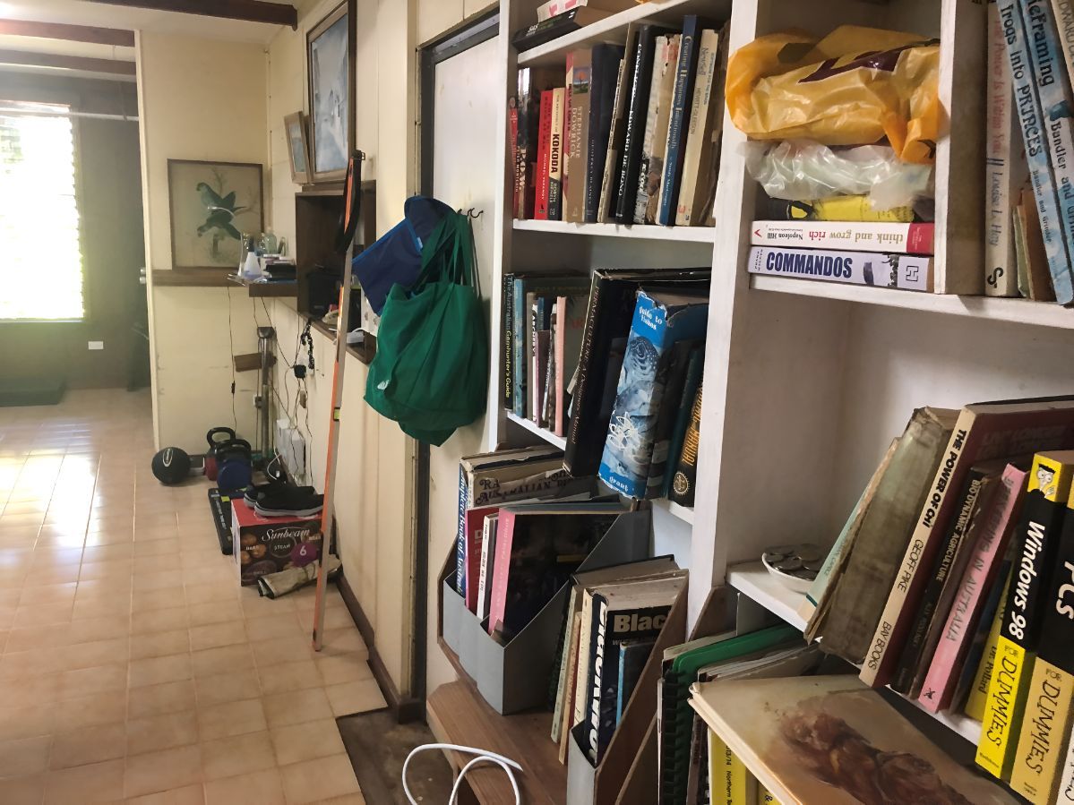 A Room With A Lot Of Books On The Shelves — Regina's Cleaning Group Pty Ltd In Lee Point, NT