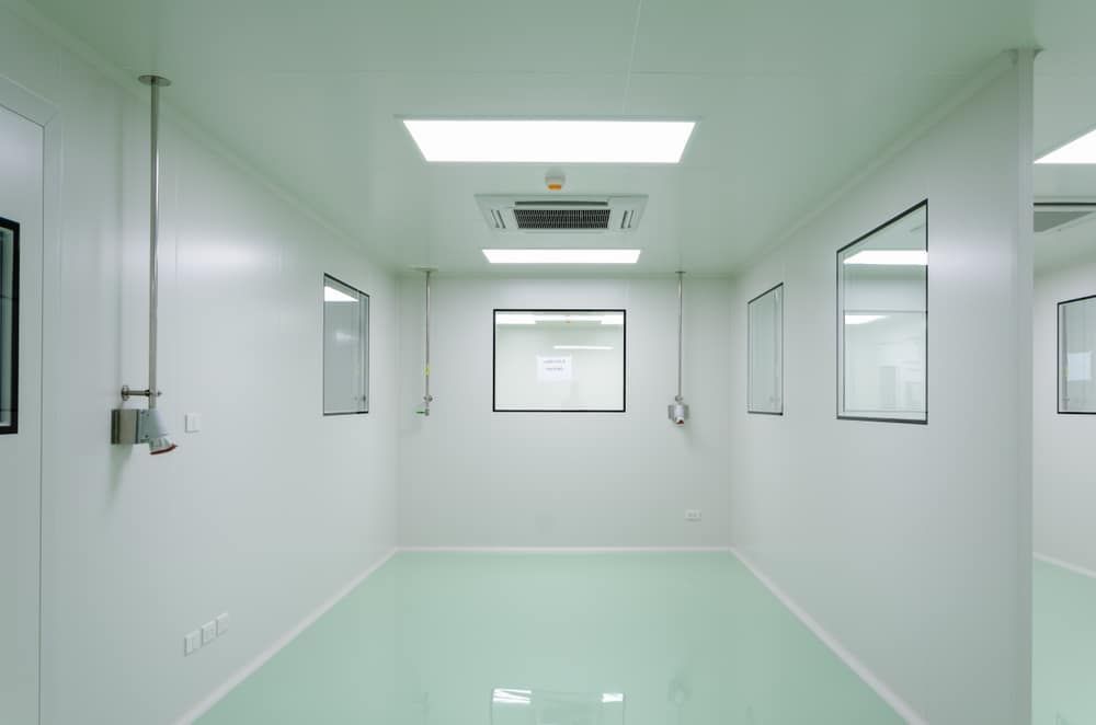 A Clean Room With White Walls and a Green Floor — Regina's Cleaning Group Pty Ltd In Lee Point, NT