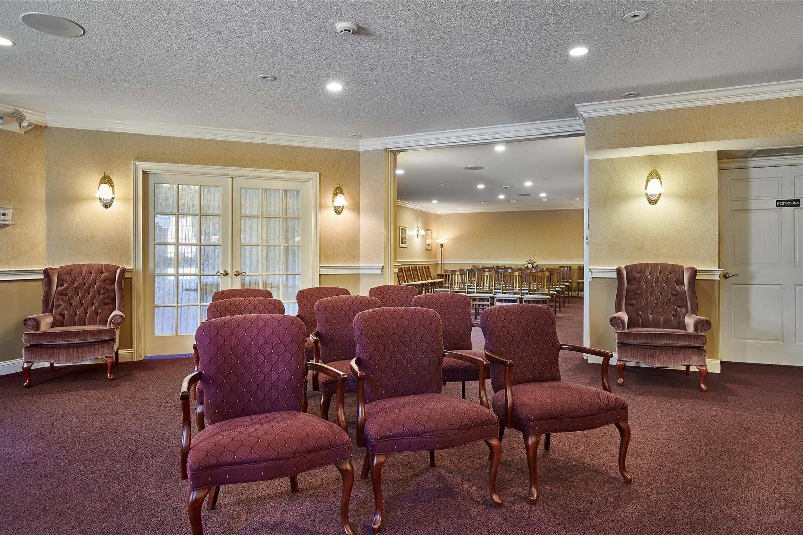 A room with a lot of chairs in it