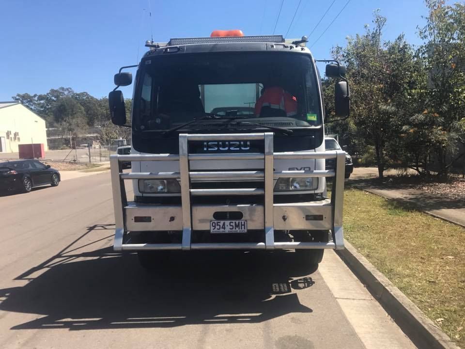 An Isuzu Truck Is Parked On The Side Of The Road — J & T Mobile Mechanics In Highworth, QLD