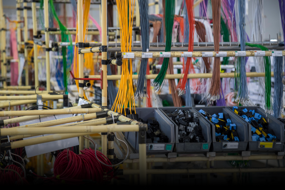 A warehouse filled with lots of wires and boxes.