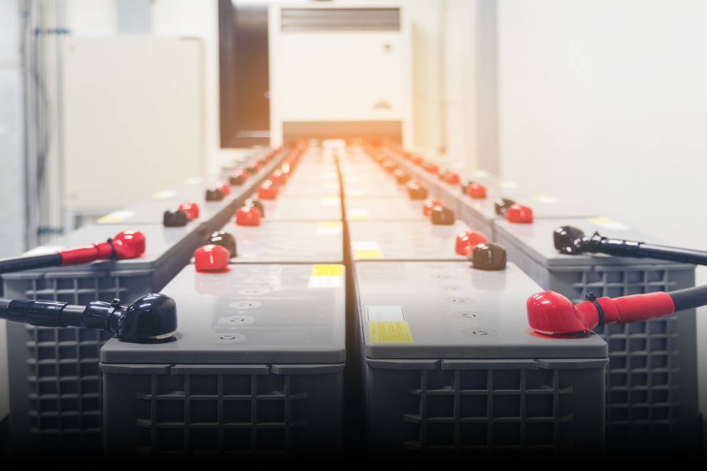 A row of batteries sitting next to each other in a room.