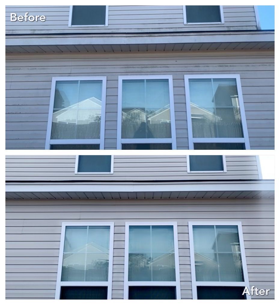 Before and after of a house exterior; faded gray siding cleaned, showing brighter appearance and windows.