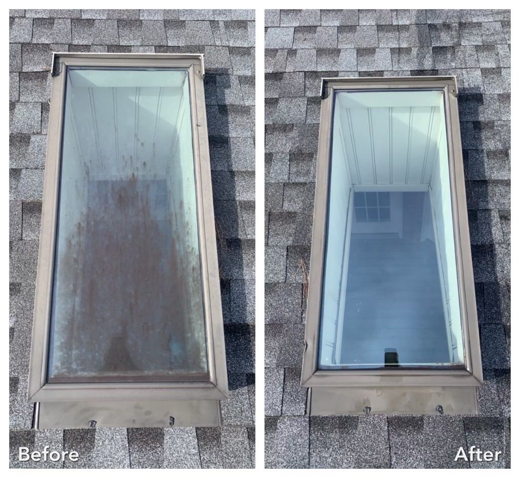 Before and after view of a cleaned skylight on a gray shingled roof.