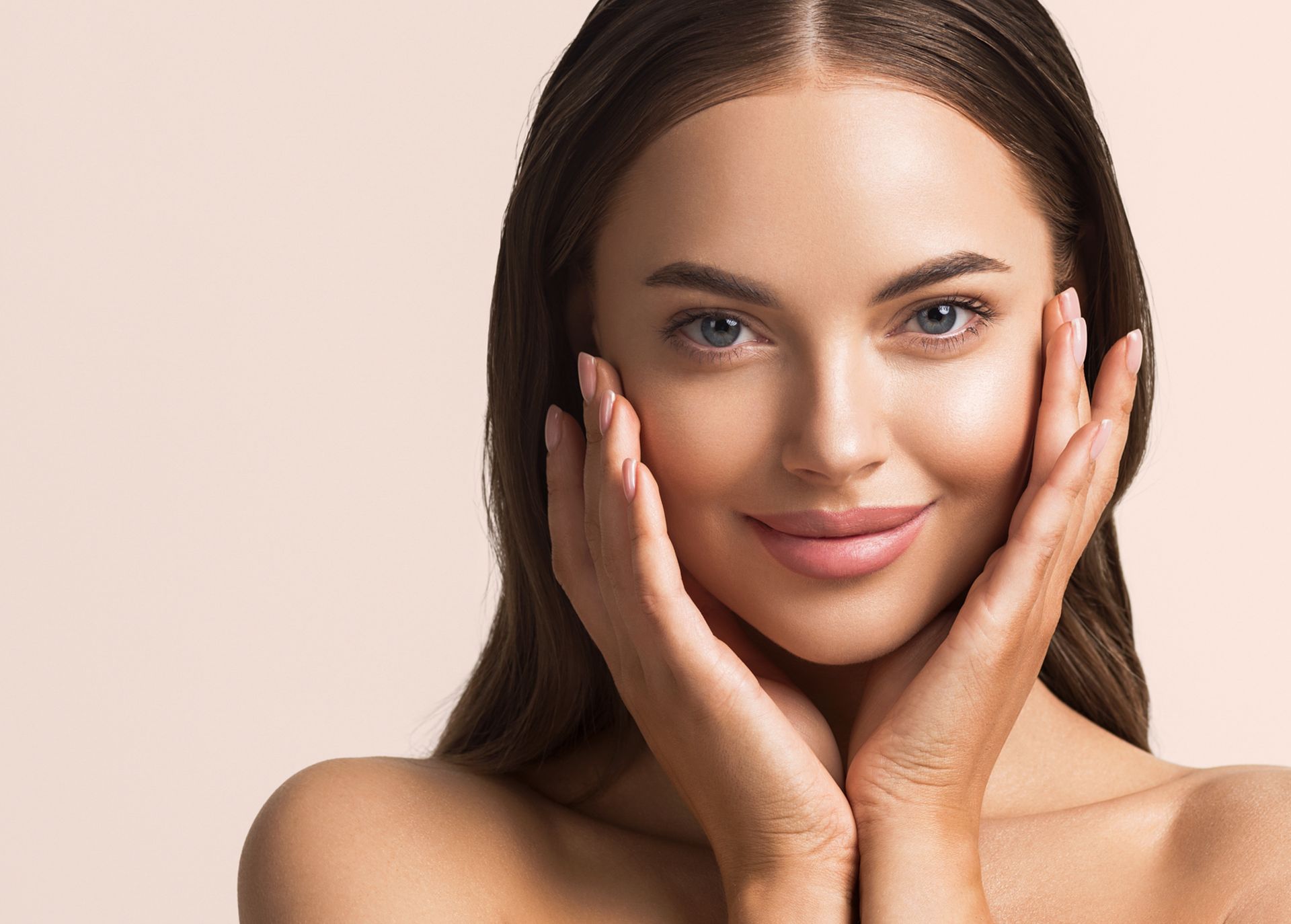 Woman with dark wavy hair and subtle makeup, looking away. Woman with dark wavy hair and subtle makeup, looking away.