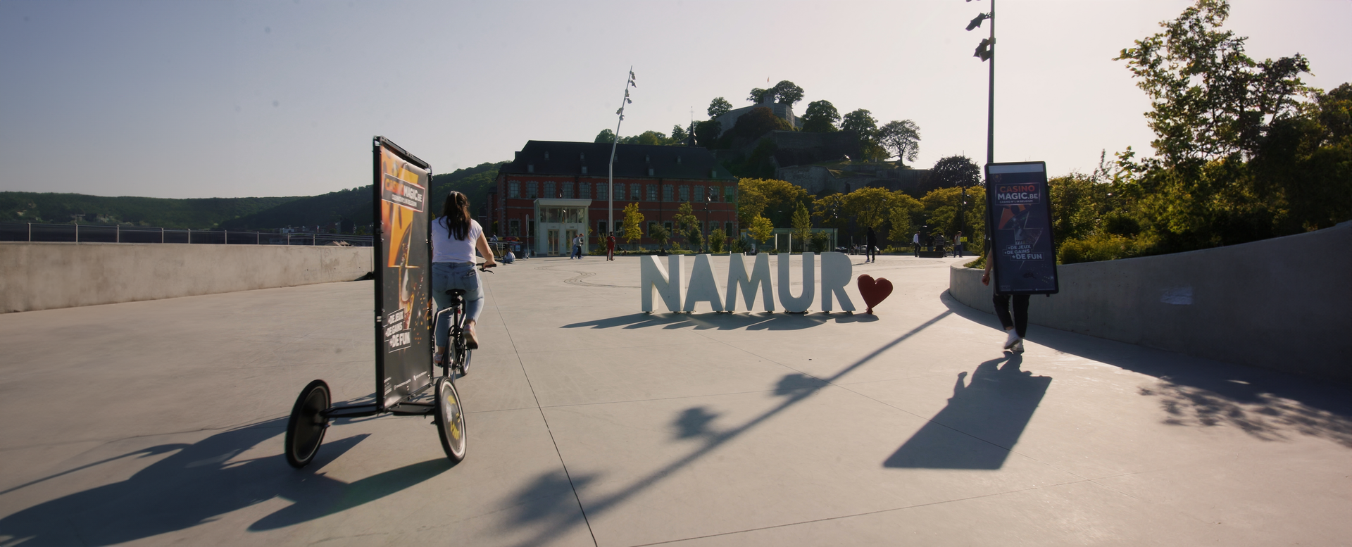Présentation Street Marketing avec vélo publicitaire à Namur