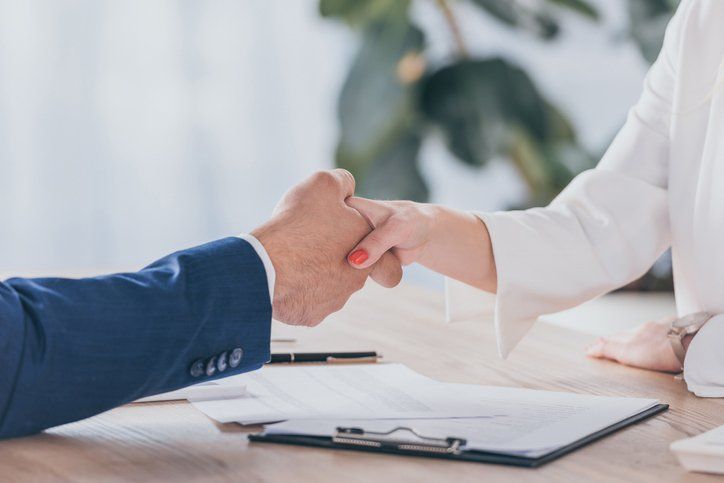 Businesswoman Shaking Hands — Fort Smith, AR — ASAP Insurance