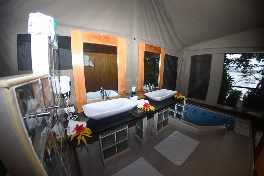 The indoor bathroom area of the deluxe safari tent at Sau Bay Resort 
