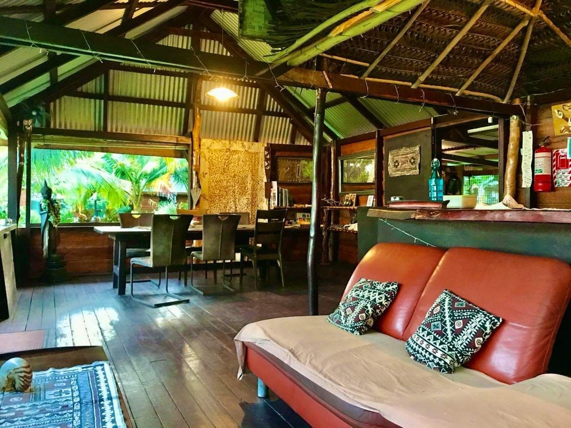 Dining area and lounge in traditional Fijian style Viani Bay Beach Resort, Fiji 