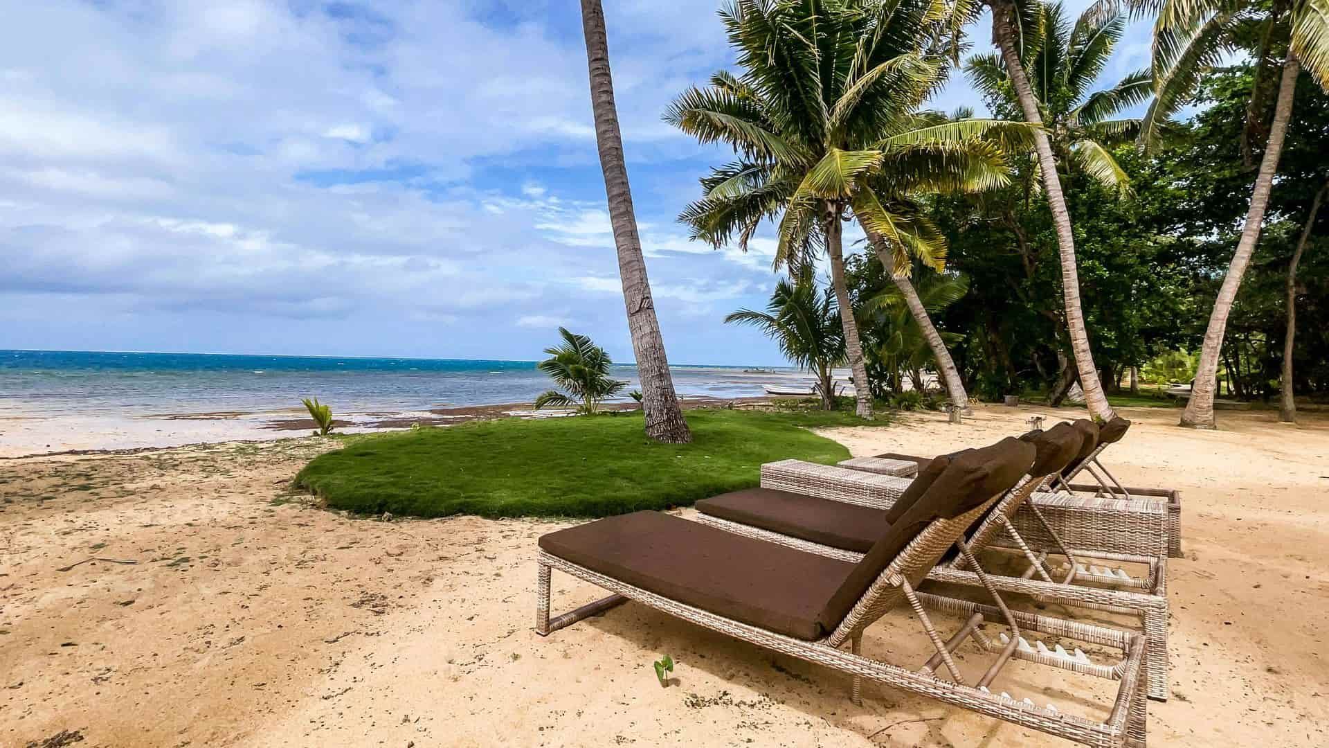 Sunbeds on the beach at Oneta Resort in Fiji 