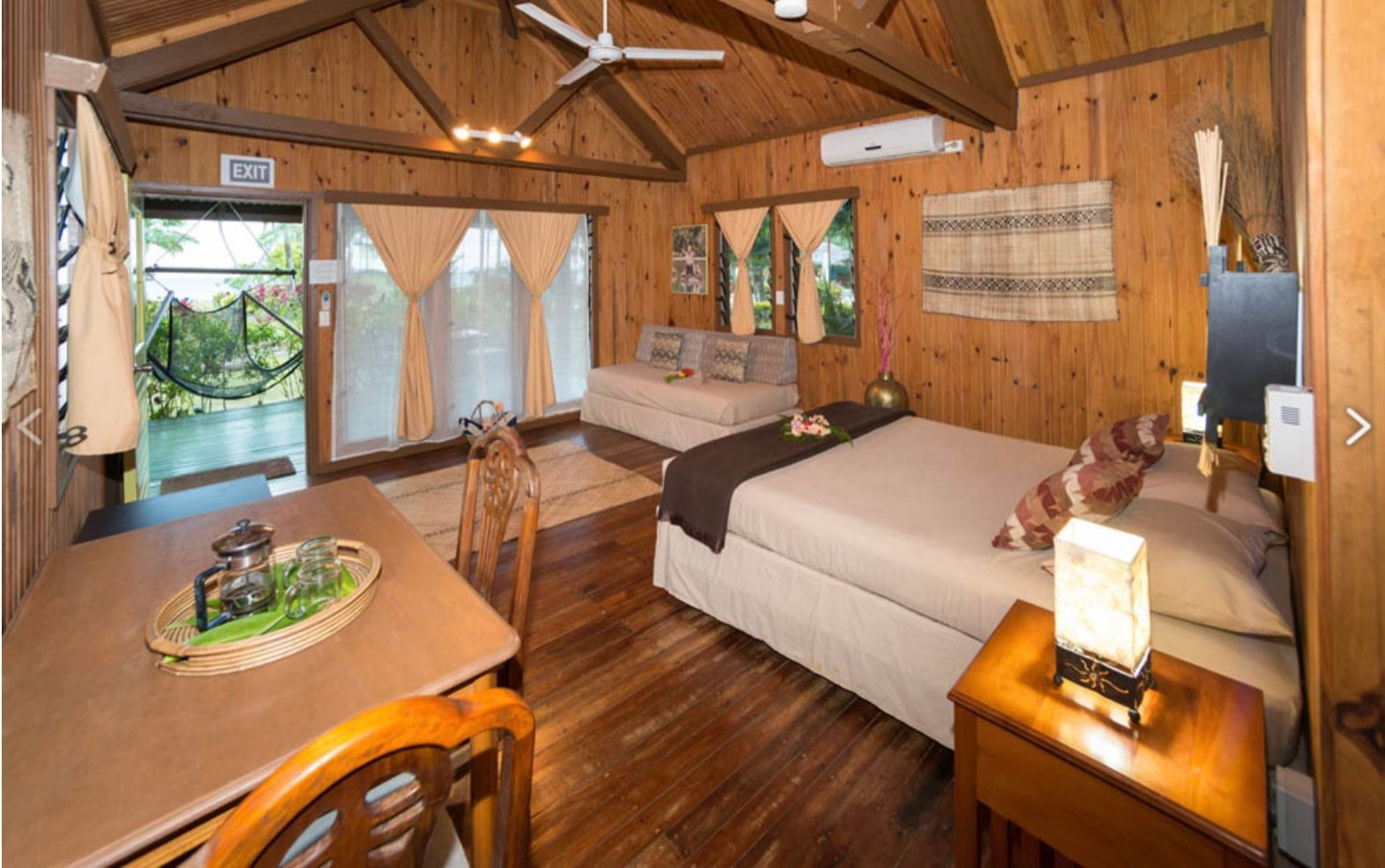 bedroom in traditional Fijian style at Waidroka Bay Resort 