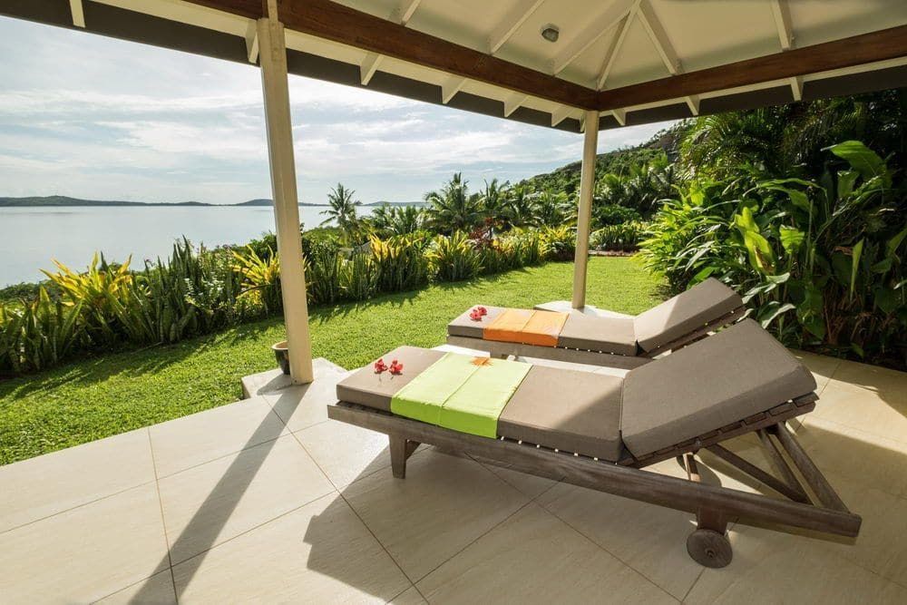 Beach beds  outside of the deluxe ocean view villa at Volivoli Beach Resort in Fiji
