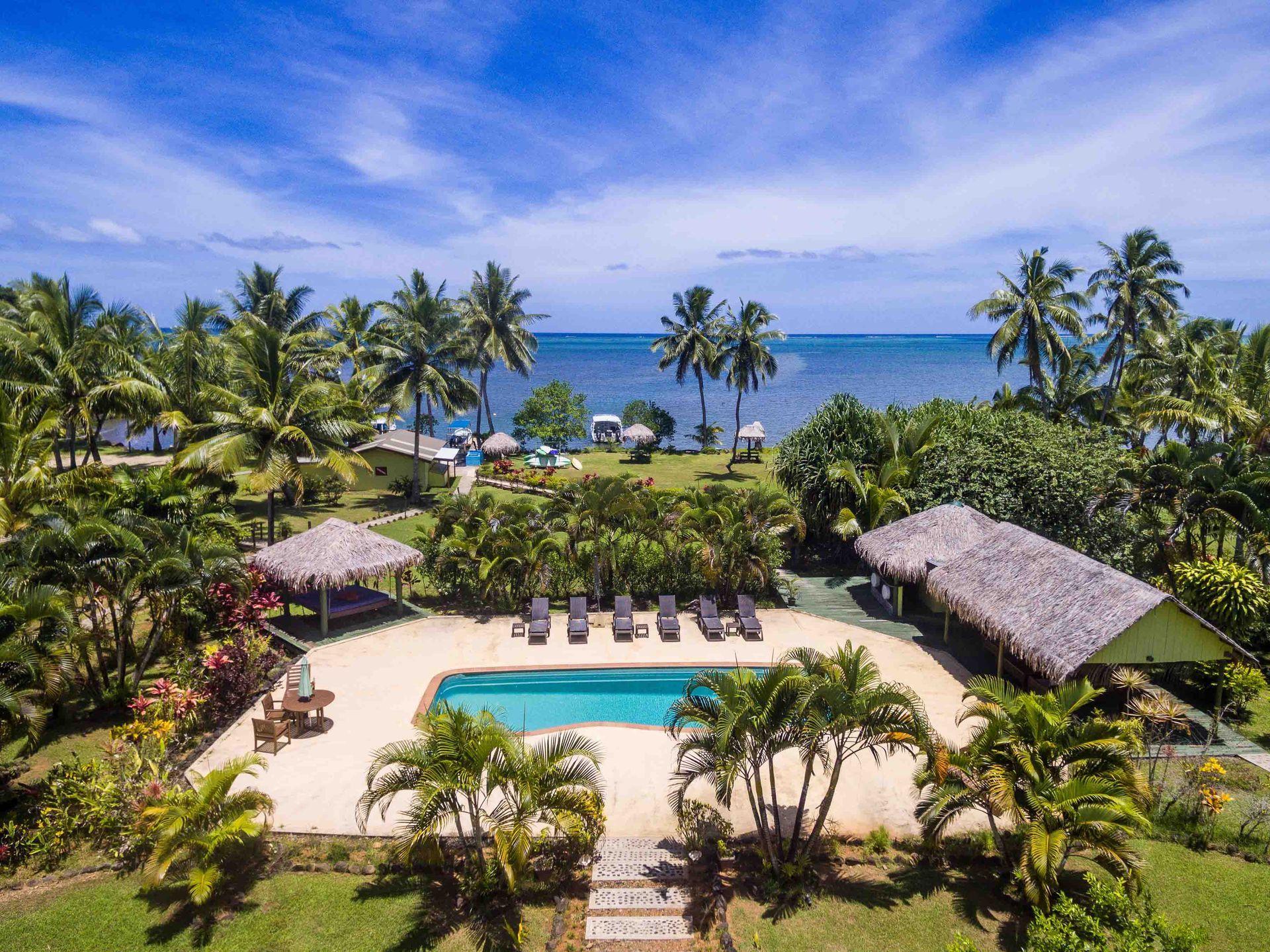 The pool area by drone at Waidroka Bay resort in Fiji 
