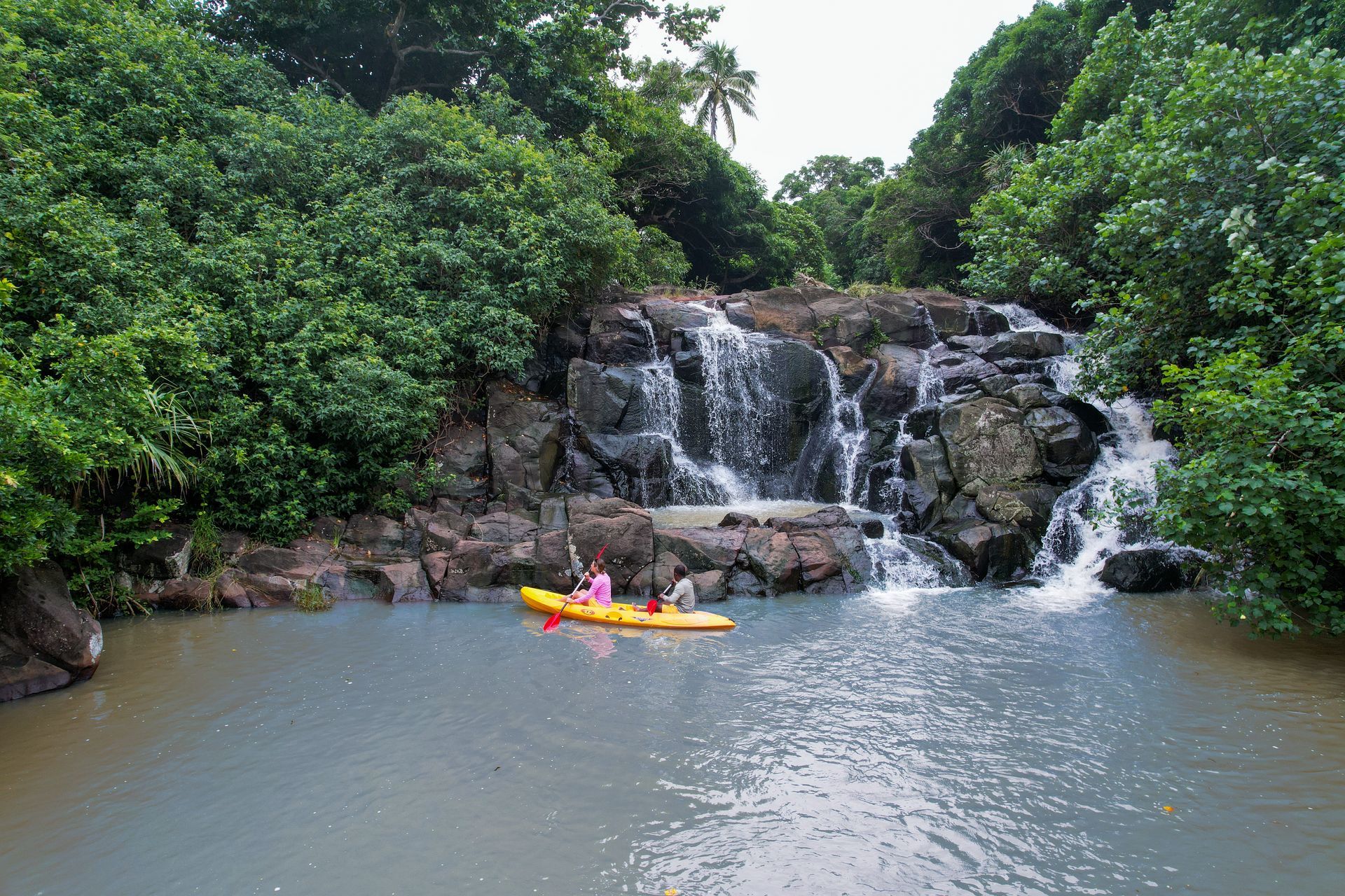 Waterfall kayaking is a popular activity in the rainforest at Oneta Resort in Kadavu