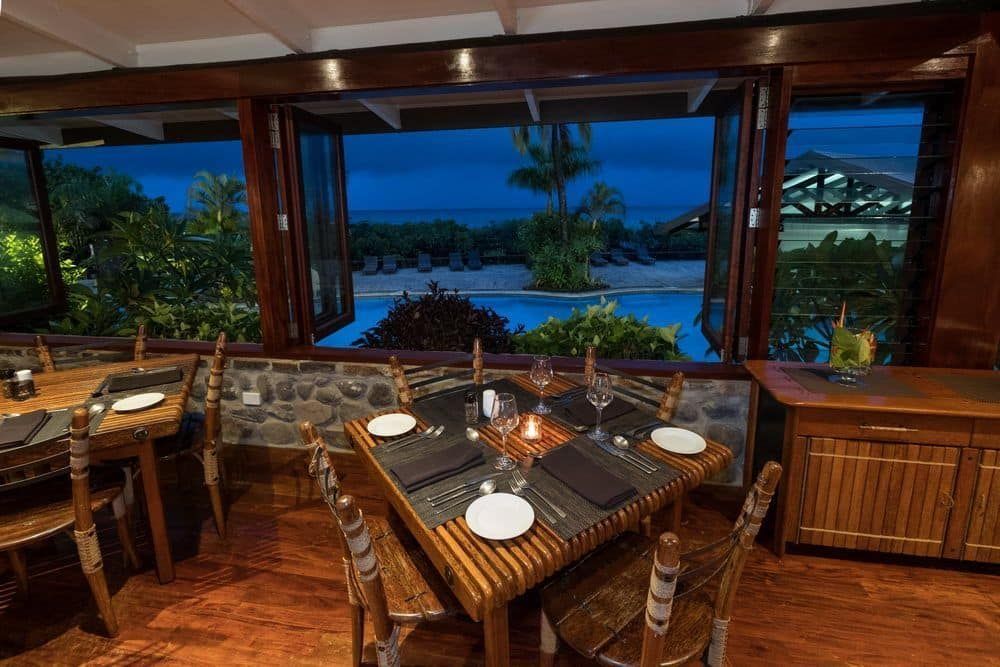 A table set for dinner at one of Volivoli Beach Resorts 3 restaurants, Nuku in Fiji 