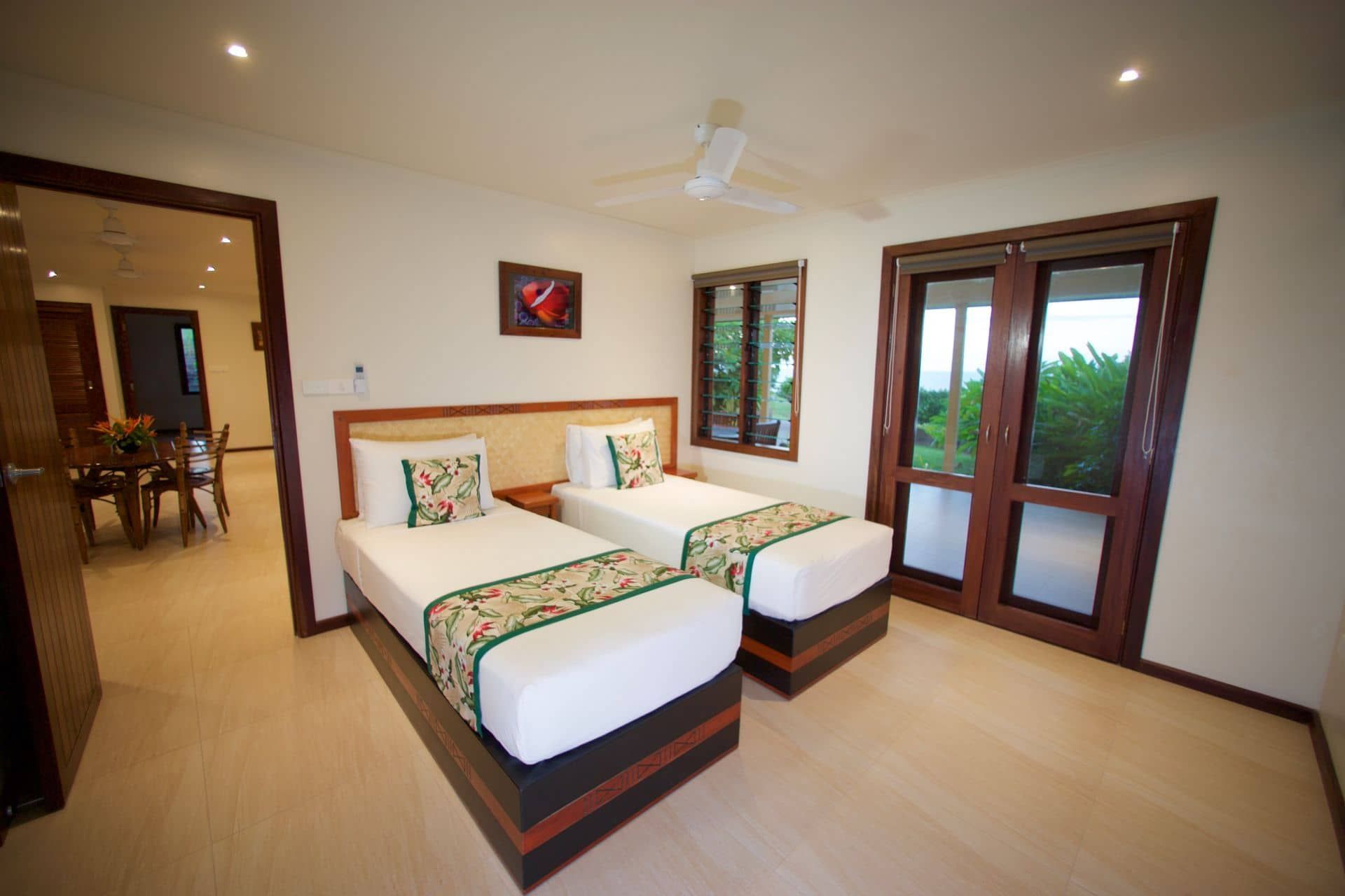 The double bedroom in the premium family villa at Volivoli Beach Resort 