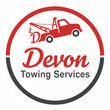 Devon Towing Services logo: Red tow truck, red cursive "Devon", text "Towing Services" within red and black circle.