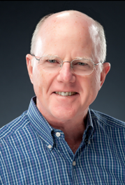 A silhouette of a woman with long hair against a white background