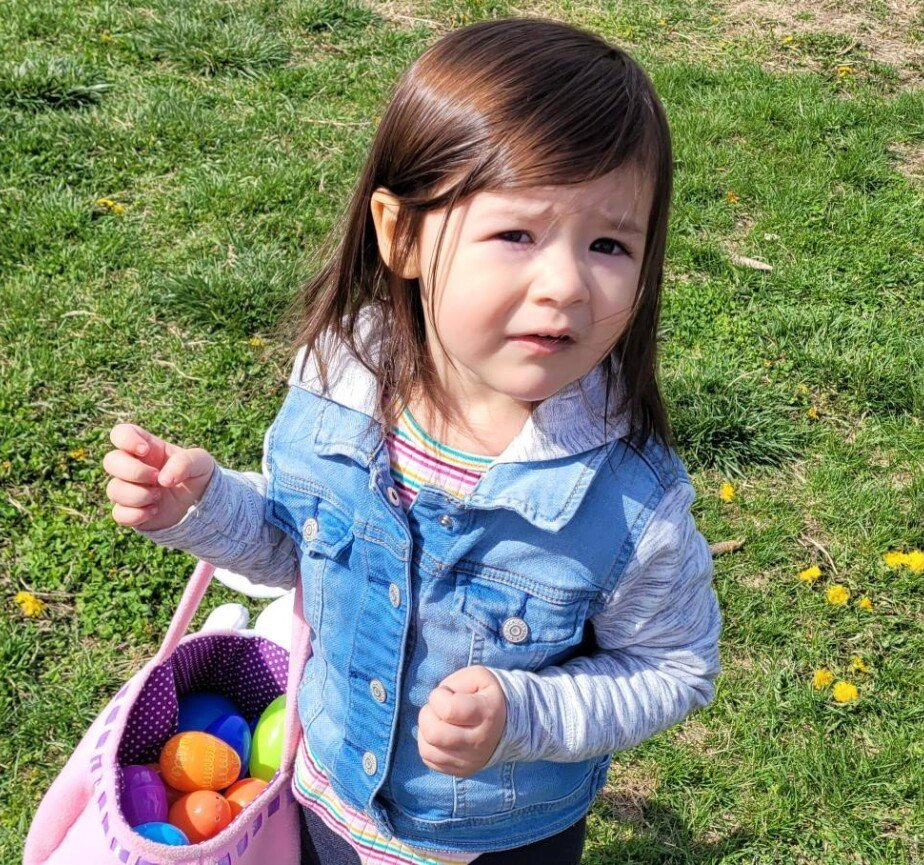 Eggstravagnza Egg Hunt Child with eggs