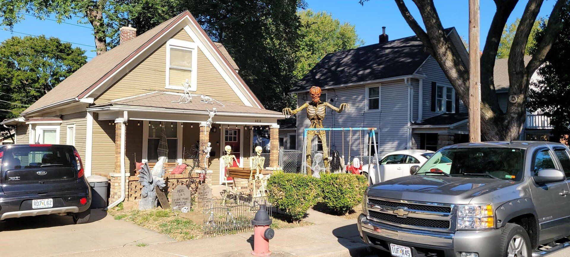 home decorated with skeletons for  Trunk or Treat 2021