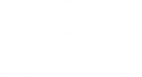 Smith Automotive sign over building, Paint & Collision. Cars parked in front. Phone number 585-872-3257.