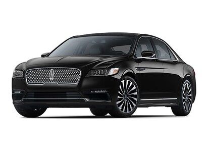 A black lincoln continental is shown on a white background.