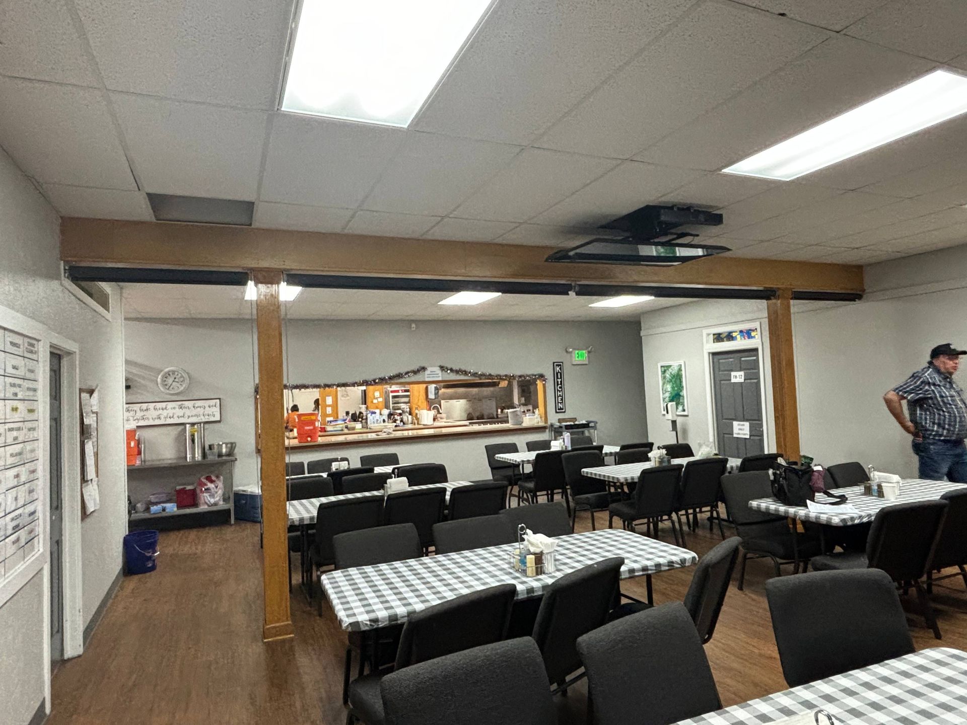 Commercial window shades, rolled up, in a restaurant, serving as an innovative room divider near Anchorage, AK