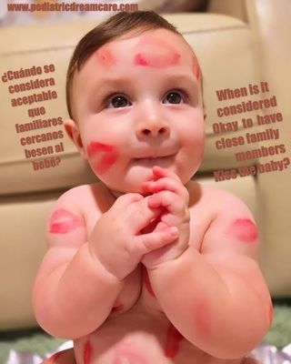 Baby covered in lipstick kisses, looking at the camera, with text in English and Spanish about kissing babies.