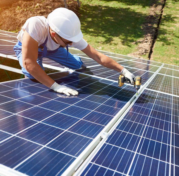 Professional worker installing solar panels — Peoria, AZ — Pro-Tech Solar Services, LLC
