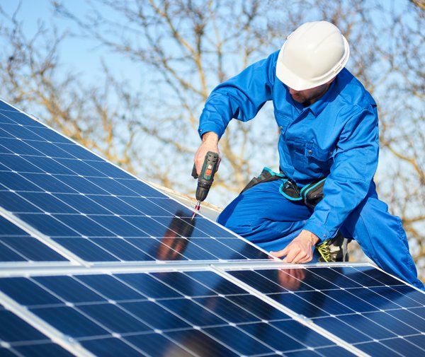 Worker installing solar panel — Peoria, AZ — Pro-Tech Solar Services, LLC