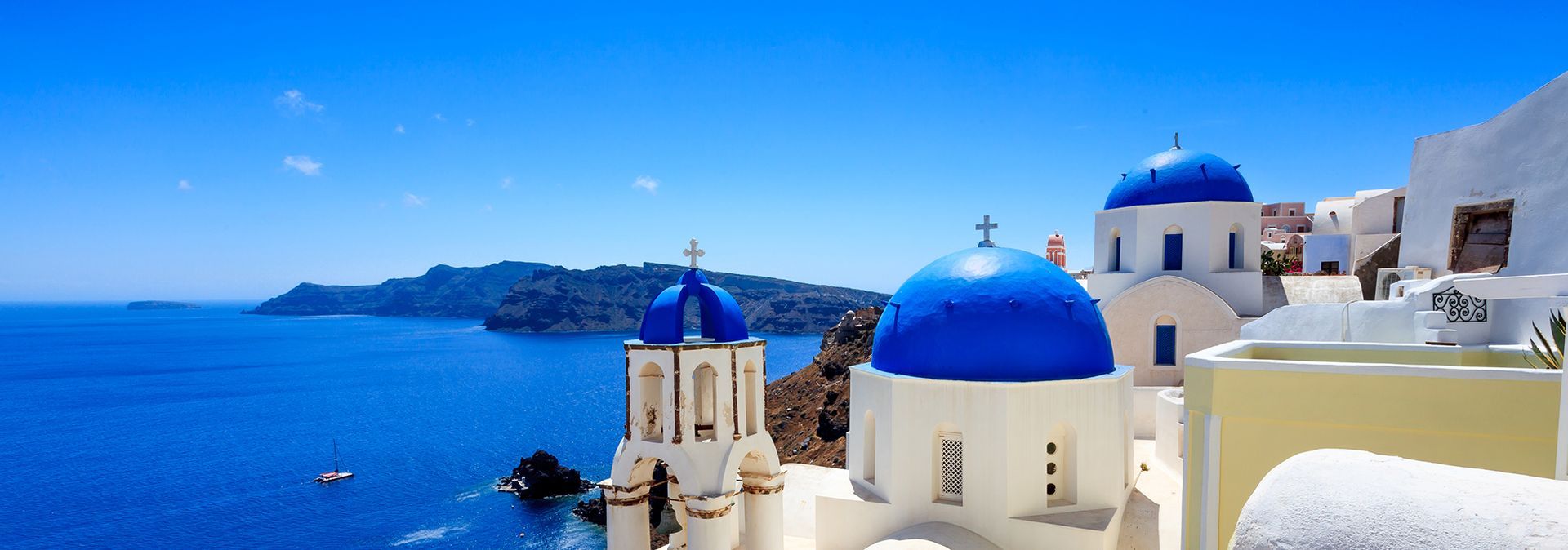 Blue Domed Church Santorini, a Greek Orthodox church in Greece.