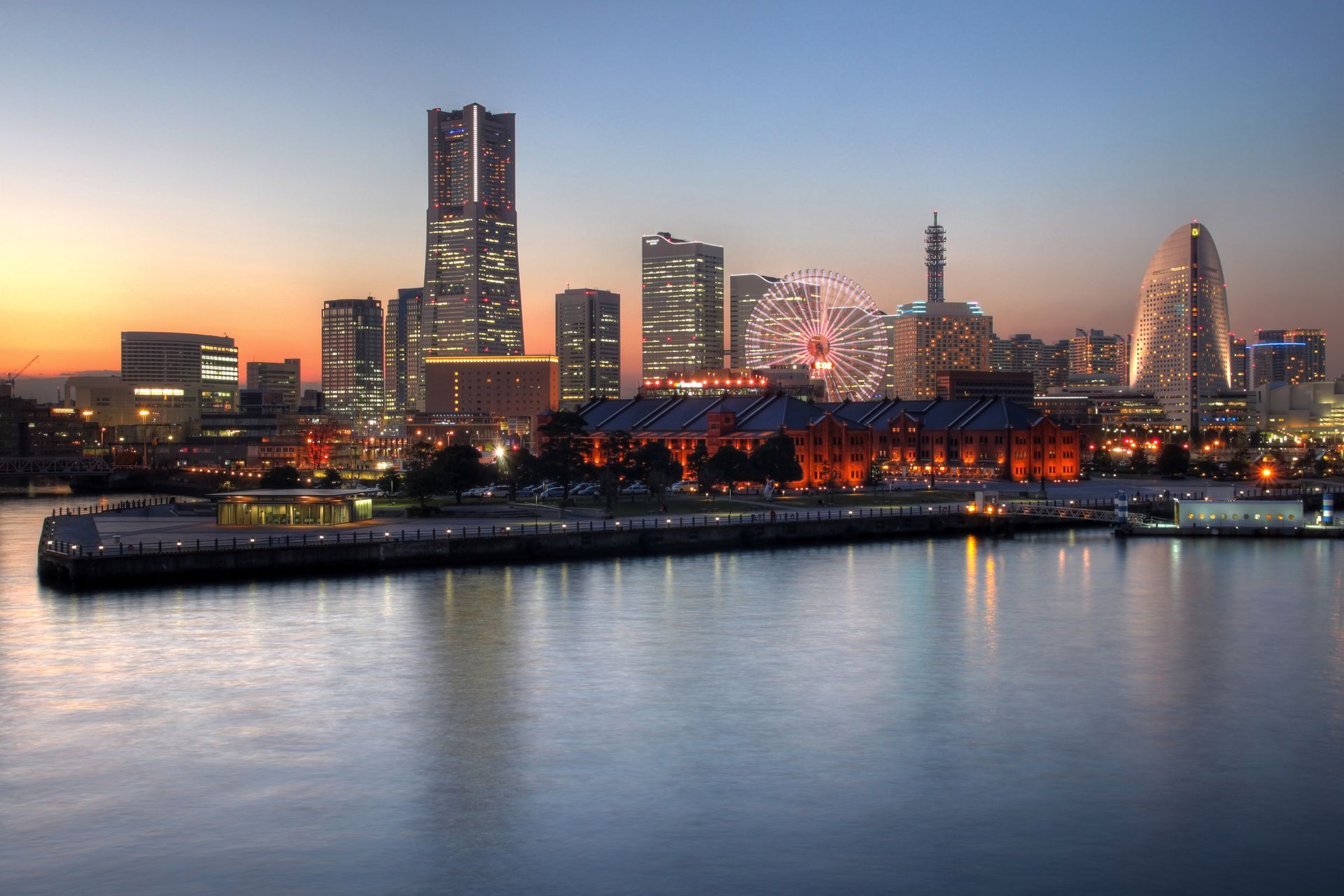 Dusk view of Minatomirai, a futuristic waterfront at Yokohama Landmark Tower and Plaza in Japan.