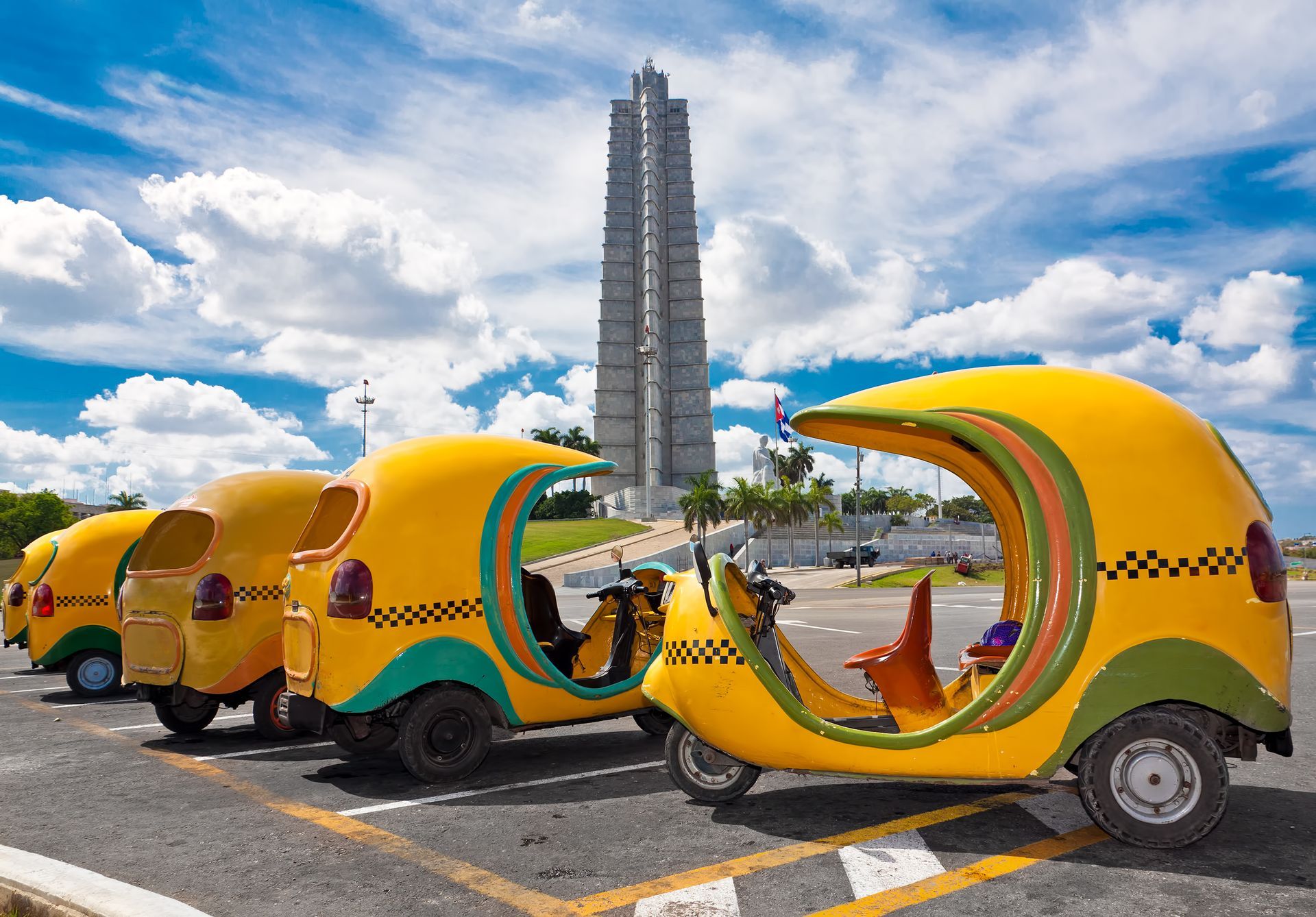 Group of Coco Taxis, a three-wheeled traditional taxi in Cuba.