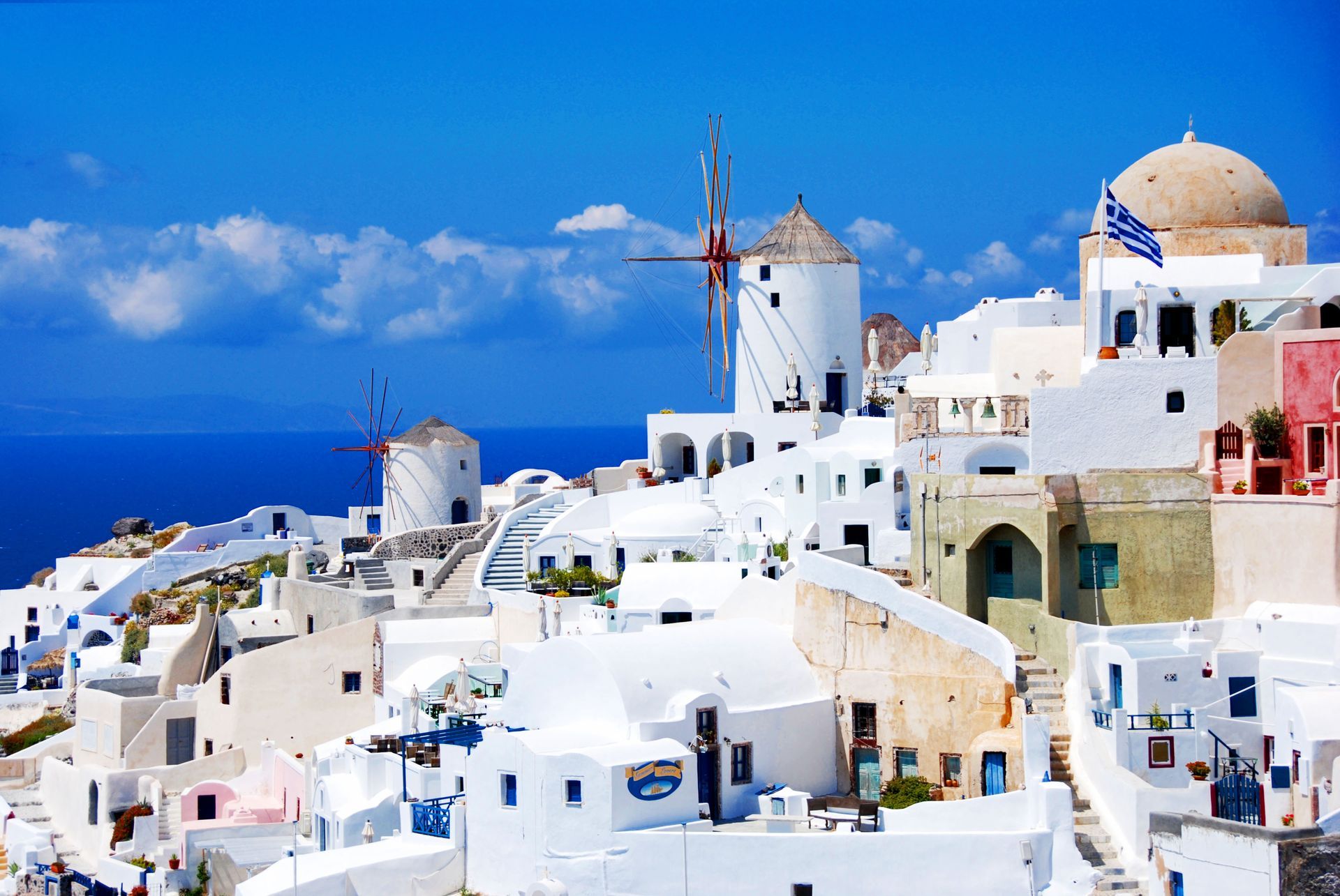 Windmills in Oia village in Santorini, Greece.