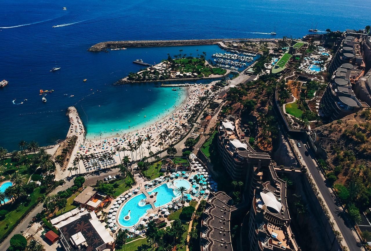 Aerial view of Playa Anfi del Mar, a beach in Spain.