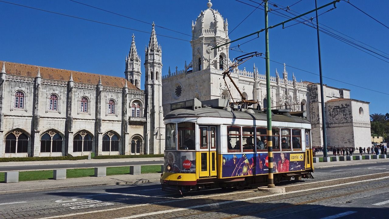 A tram in front of Jerónimos Monastery in Lisbon, Portugal.