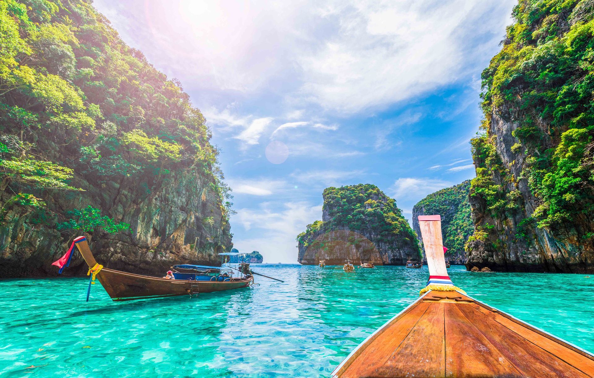Boat view of Phi Phi Islands located between the large island of Phuket and the Straits of Malacca coast of Thailand.