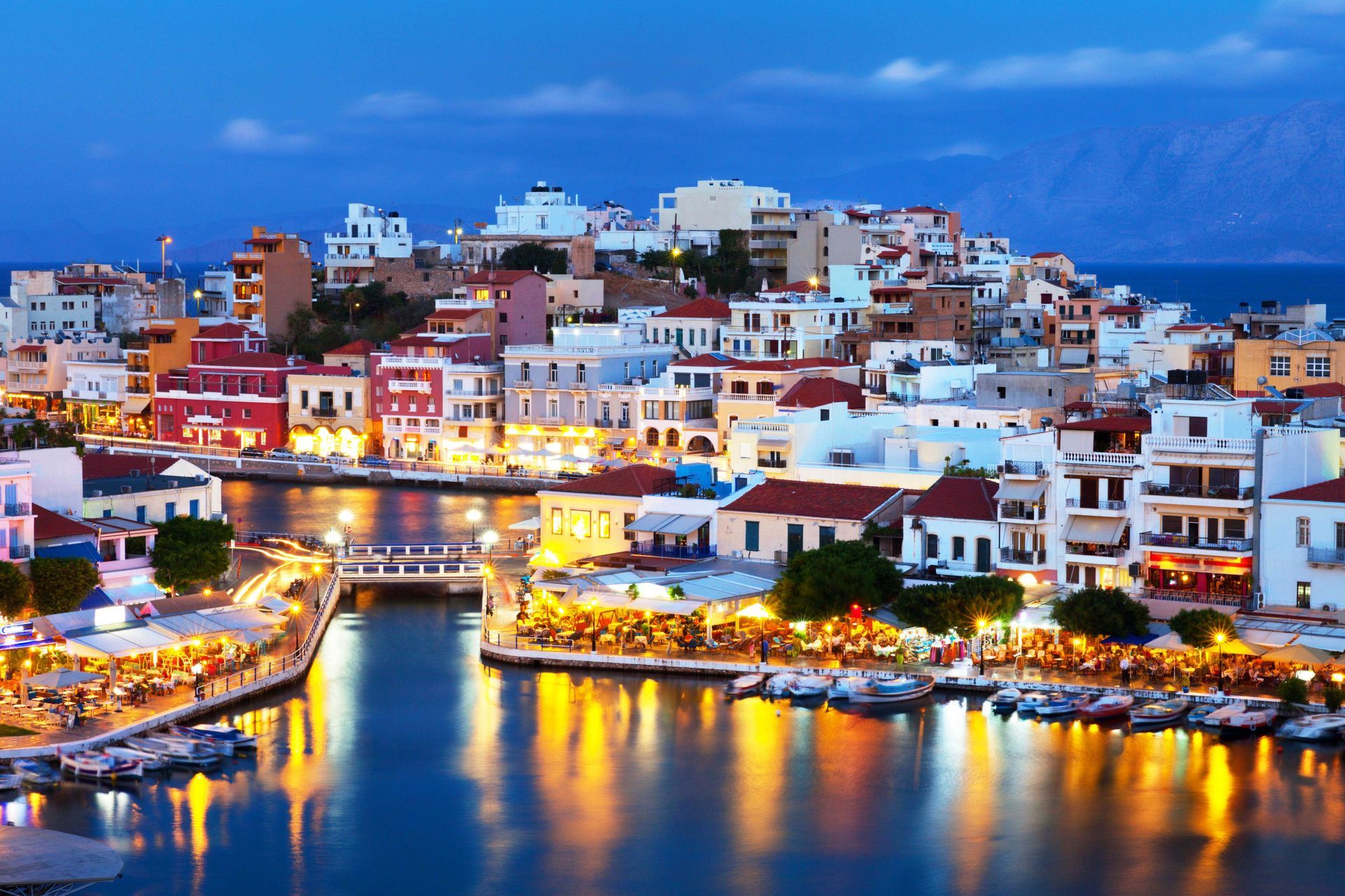 Dusk view of Agios Nikolaos, a city in Crete, Greece.