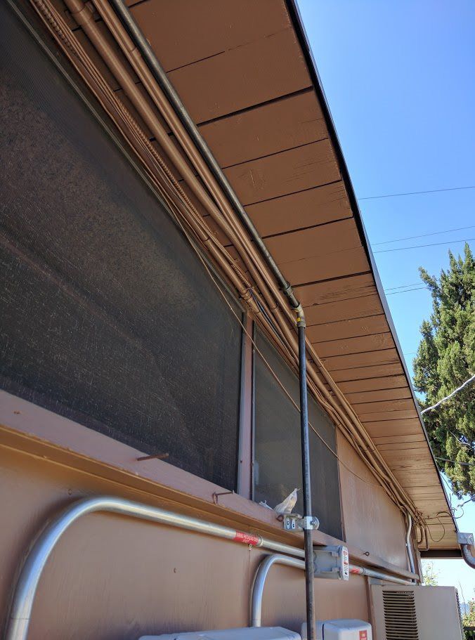 A building with a lot of wires coming out of it