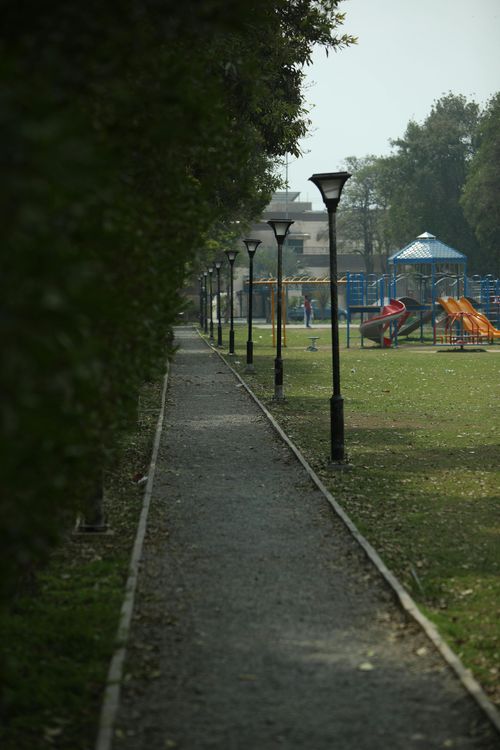 Walking path and playground in a park